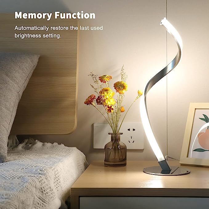 LED Stehlampe in geschwungener Optik aus hochwertigem Material zum wohlfühlen
